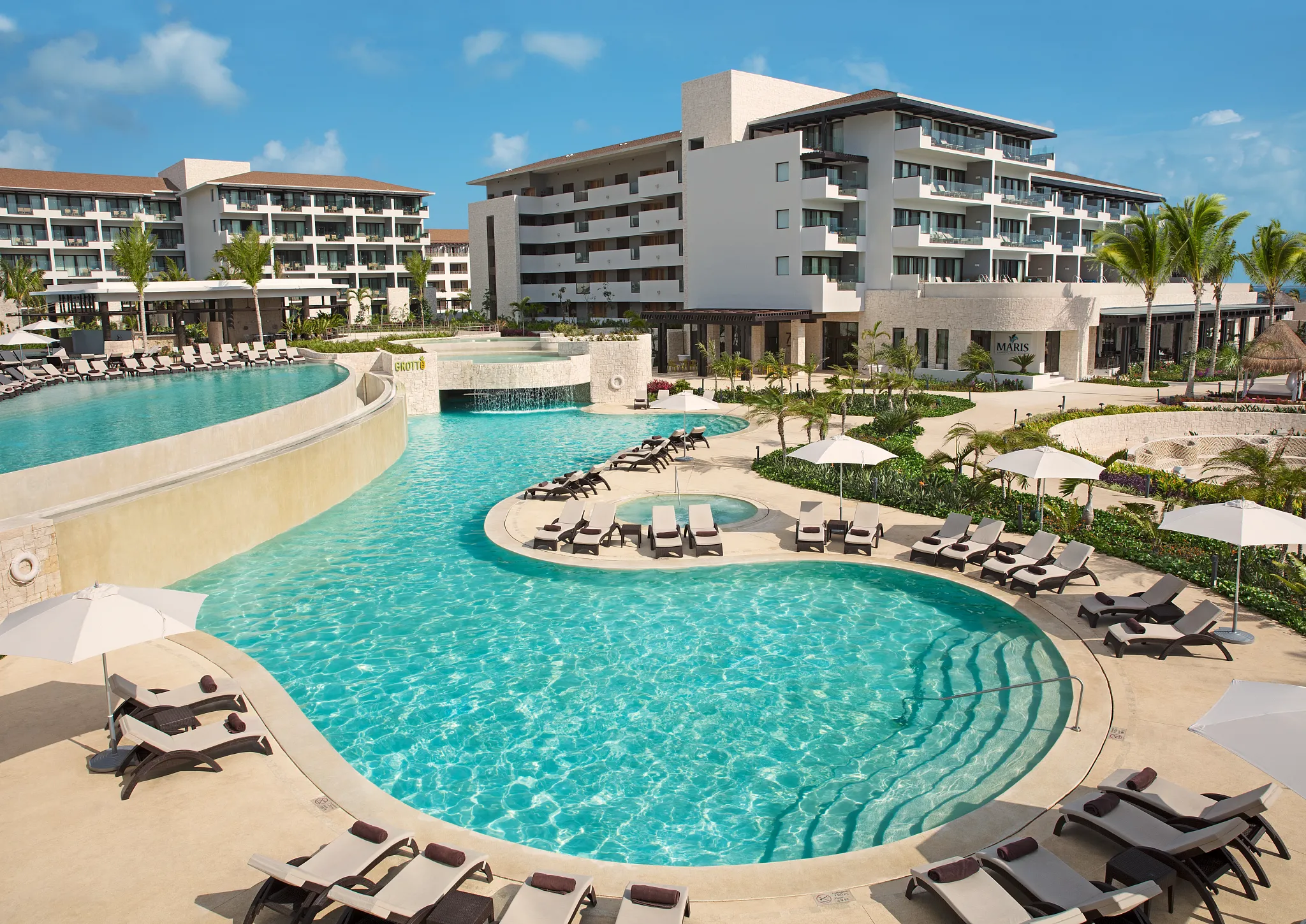 DREPM-EXT-GrottoPool-1-CB Dreams Playa Mujeres Mexico Destination Wedding